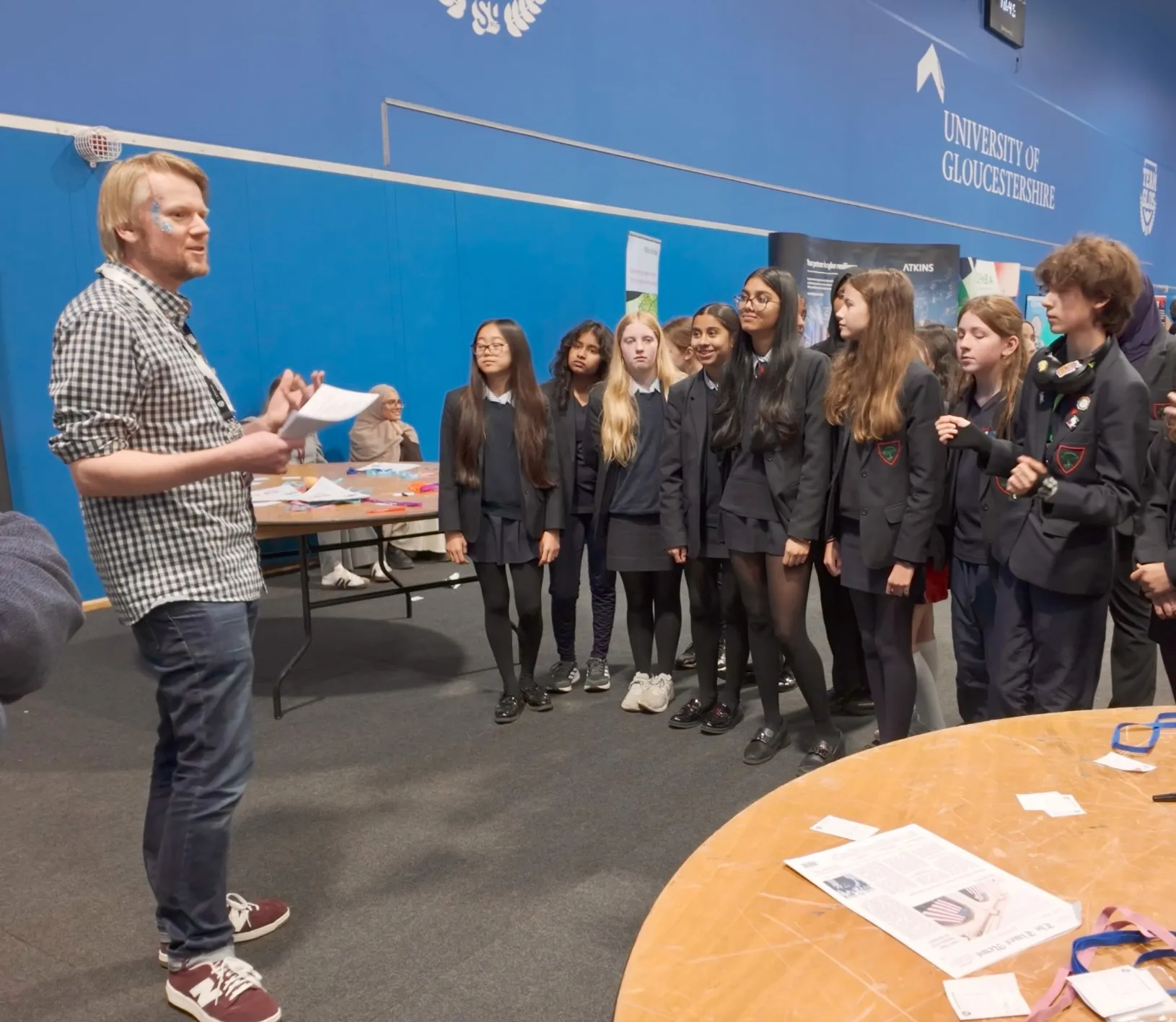 Andy introducing the Chicken Shop activity to students at EmPower